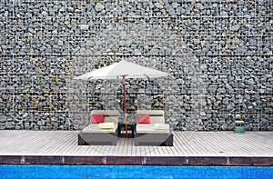 Beach bed with rock wall background