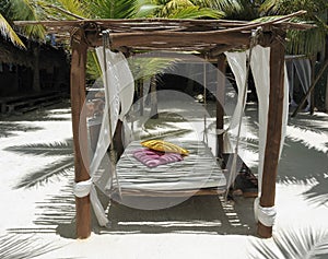 Beach bed on white sand