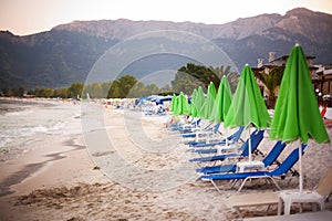 Beach beds and umbrellas in Thassos photo