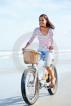 Beach bicycle woman