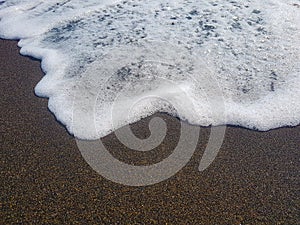 Sea wave on the shore. photo