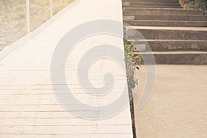 Beach Boardwalk. Wooden walkover near the beach. Vintage filter tinting, sun haze, glare