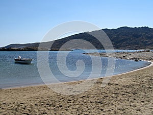 Beach with a boat at an island
