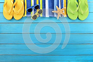 Summer background beach border flip flops sunglasses copy space