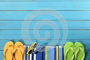 Summer beach background border flip flops sunglasses copy space