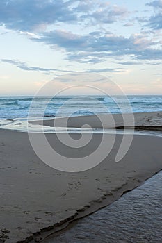 Beach in brazil with a stream