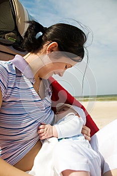 Beach breast feeding fun