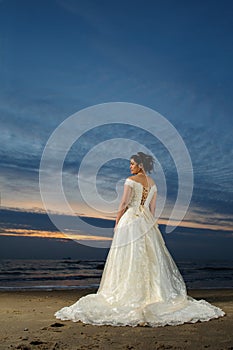 Beach bride at sunset