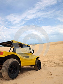 Beach buggy in sand dunes