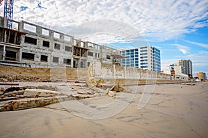 Beach buildings seawalls damaged by heavy surf from Hurricane Nicole Daytona Beach Florida