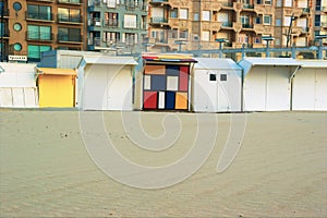 Beach cabins on a sandy beach