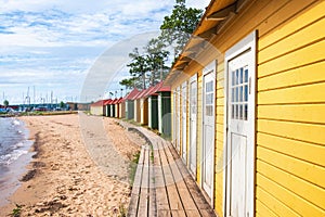 Beach cabins at a sandy beach