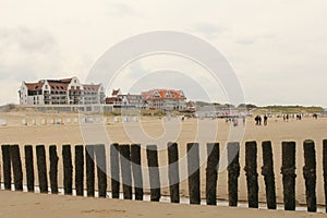 The beach of cadzand with hotels and restaurants at the dunes in the background