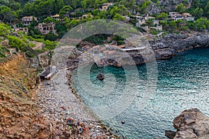 Beach Cala Deia at coast of Mallorca, Baleares, Spain photo