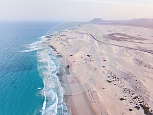 Beach in Canary islands, Fuerteventura, Corralejo aerial view photo