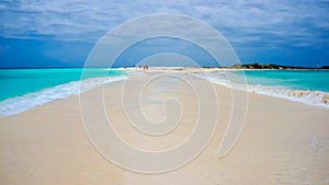 Beach in Caribbean with a sand pathway