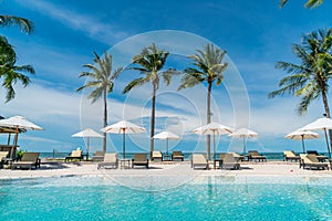 Beach chair around swimming pool in hotel resort