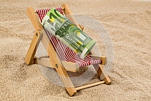 Beach chair with euro banknote