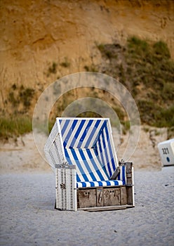 Beach chair at evening on the beach