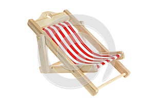 Beach chair isolated on white. Red and white striped deck chair