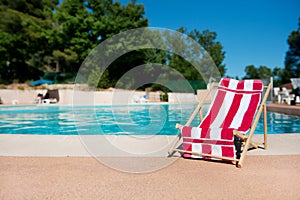 Beach chair near swimming pool