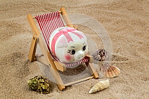 Beach chair with piggy bank