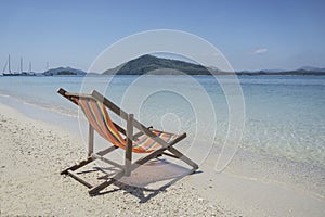 Beach chair at sunny beach in Thailand