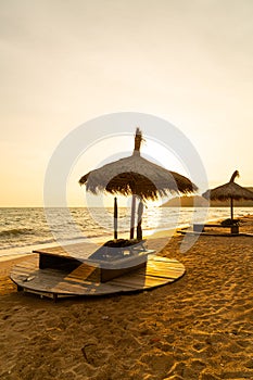 Beach chair and umbrella with sea beach background