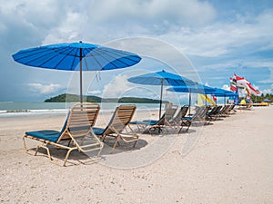 Beach Chair with Umbrella on the Tropical Beach