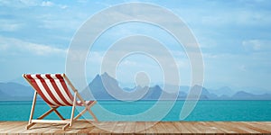 Beach Chair on wooden deck terrace on the beach