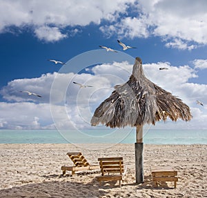 Beach chairs and a cabana in Miami Beach Florida photo