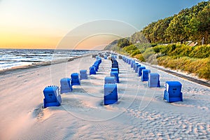Beach chairs in morning light at the beach