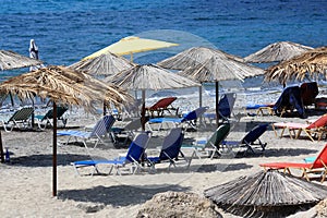 Beach chairs and parasols