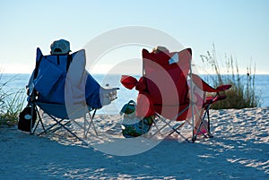 Beach chairs with people