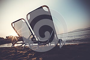 Beach chairs at sunrise