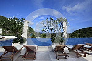 Beach chairs at swimming pool