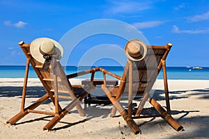 Beach chairs on tropical sand beach in Boracay, Philippines