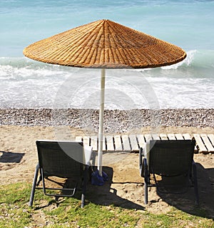 Beach chairs and umbrella