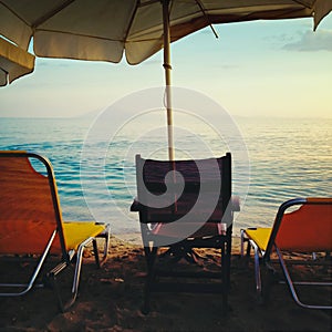 Beach chairs and umbrella