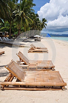 Beach chairs on white sand beach in Boracay