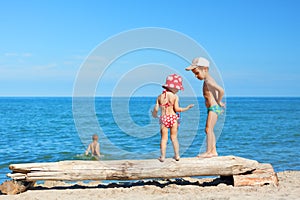 Beach children play summer vacations