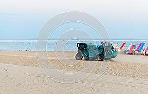 Beach Cleaning Machine on Sand. Copy space.