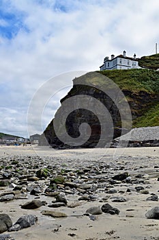 The beach and cliffs at Portreath, Cornwall, England