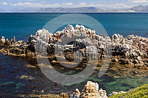 Beach, cliffs, sea and rockpools at De Kelders - Overberg