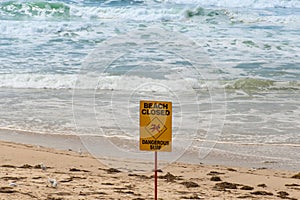 Beach closed and dangerous surf sign for swimmers in Australia