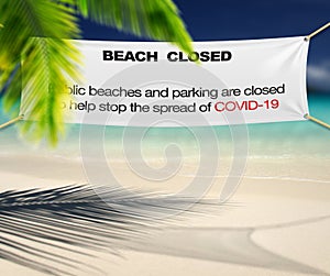 Beach closed sign. Warning of coronavirus or covid-19. Travel concept. Palm Trees on the beach