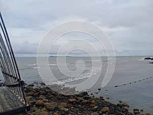 Beach with cloudy sky in Anyer