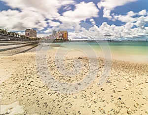 Beach coast lined with palm trees of Distortion Seaside, Oak fashion, Depot Island Seaside buildings and Vessel Hotel Campana in