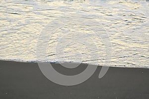 beach coast surf at sunset detail mediteran sea kalymnos greece