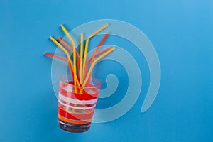 beach cockail with many straws